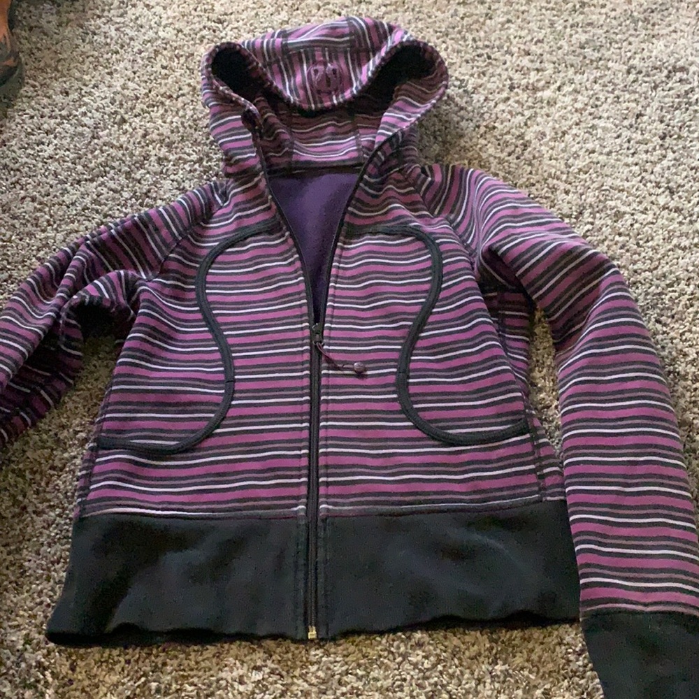 Purple and black striped lululemon zip up sweater.